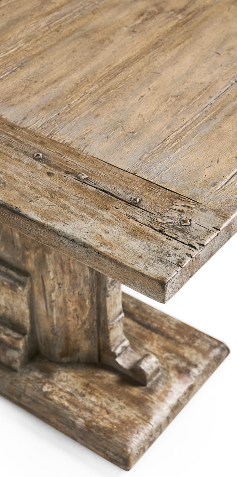 Reclaimed timber refectory table corner with pegged trestle base